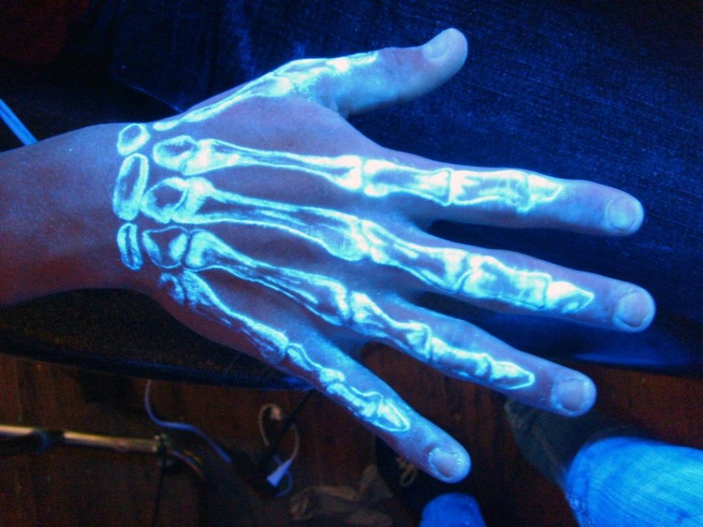 ultraviolet hand tattoo